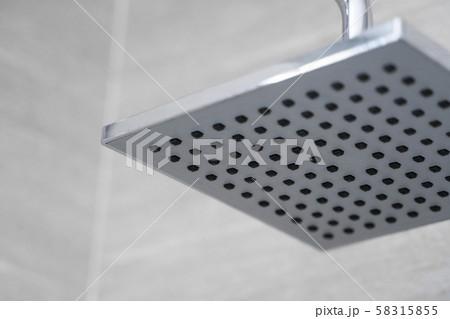 Square shower head in a modern bathroom. Shower in the bathroom with water spray or water. Feel 58315855