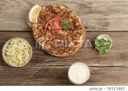 Traditional Turkish pizza that is made of ground 58315982