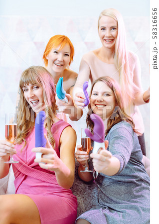 Women showing sex toys they bought at a dildo party Women showing sex toys they bought at a dildo party 58316656