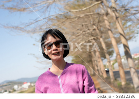 happy smiling asian woman happy smiling asian woman 58322236