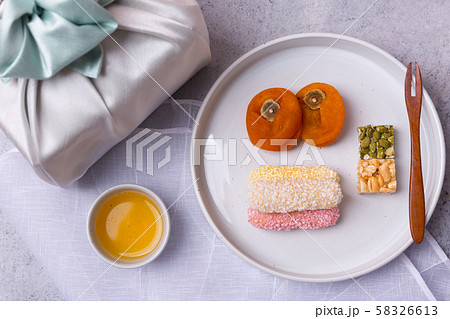 Concept of Korean traditional objects, wrapping cloth and refreshments. 072 Concept of Korean traditional objects, wrapping cloth and refreshments. 072 58326613