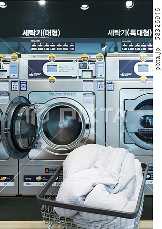 Single life concept, washing machines at laundromat 165 Single life concept, washing machines at laundromat 165 58326946