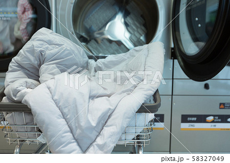 Single life concept, washing machines at laundromat 027 Single life concept, washing machines at laundromat 027 58327049