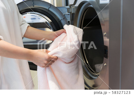 Single life concept, washing machines at laundromat 085 58327123