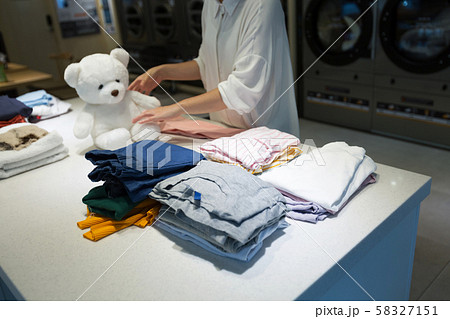 Single life concept, washing machines at laundromat 055 Single life concept, washing machines at laundromat 055 58327151