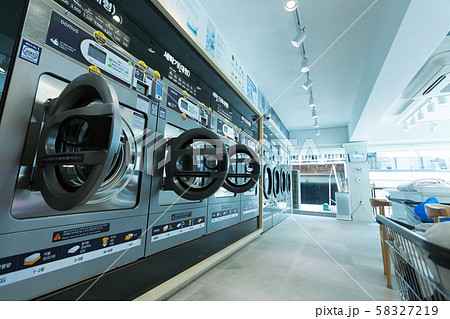 Single life concept, washing machines at laundromat 042 Single life concept, washing machines at laundromat 042 58327219