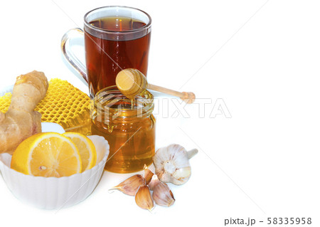 Honey on the background of honeycomb. Honey Honey on the background of honeycomb. Honey 58335958