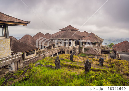 Abandoned and mysterious hotel in Bedugul. Indonesia, Bali Island Abandoned and mysterious hotel in Bedugul. Indonesia, Bali Island 58341649