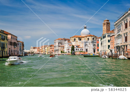 Boats and gondolas on Grand Canal in Venice, Italy Boats and gondolas on Grand Canal in Venice, Italy 58344025