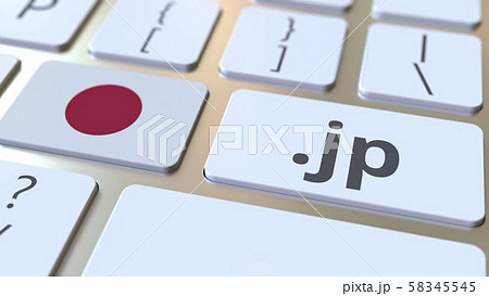 Japanese domain .jp and flag of Japan on the buttons on the computer keyboard. National internet 58345545