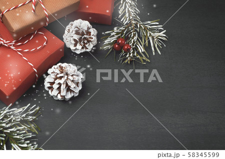 Christmas composition, blank for design - gifts and decorations on a textured background, copy space Christmas composition, blank for design - gifts and decorations on a textured background, copy space 58345599
