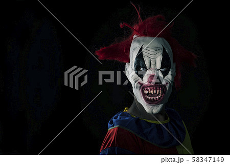 scary evil clown with a bloody mouth scary evil clown with a bloody mouth 58347149