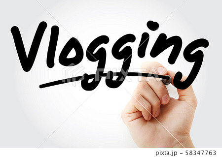 Hand writing Vlogging text with marker Hand writing Vlogging text with marker 58347763