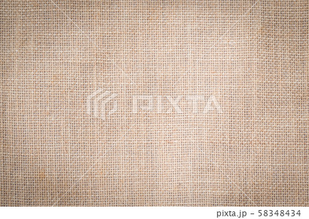 Hessian sackcloth woven texture pattern background in tan sepia beige cream brown color 58348434