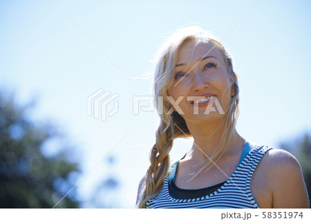 Happy woman enjoying outdoors Happy woman enjoying outdoors 58351974