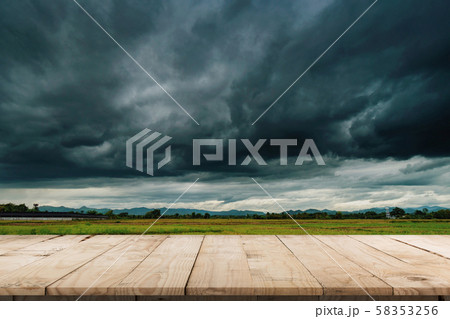 Natural scenic beautiful field storm clouds  and 58353256