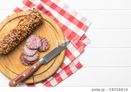 Sliced spicy salami sausage Sliced spicy salami sausage 58358819