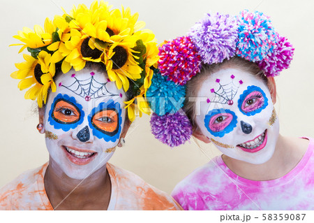 Two Teenage Girls in Dia de los Muertos Halloween 58359087