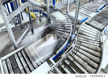 Transportation line conveyor roller with container 58360053