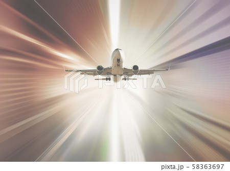 Aircraft flying in divergent sunlight 58363697