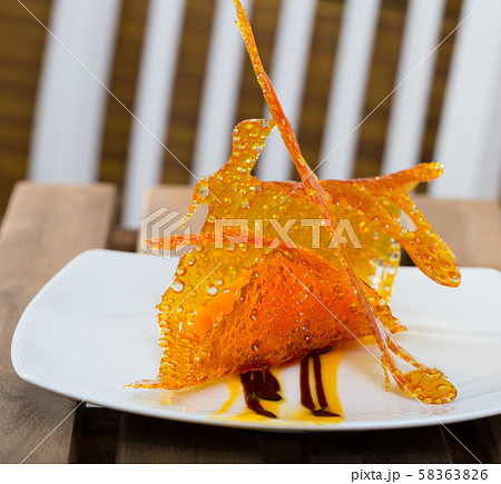 Pumpkin in caramel lace dessert Pumpkin in caramel lace dessert 58363826