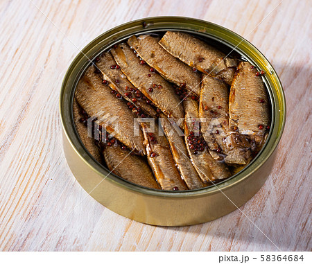Canned small smoked sardines from Riga in open tin can, nobody 58364684