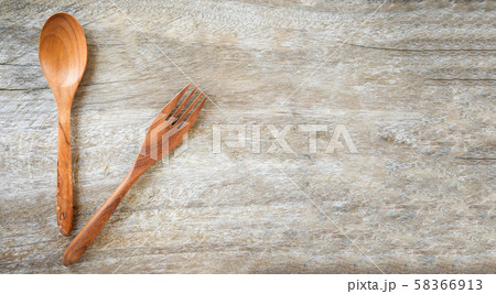 Wooden spoon and fork kitchenware set on wooden Wooden spoon and fork kitchenware set on wooden 58366913