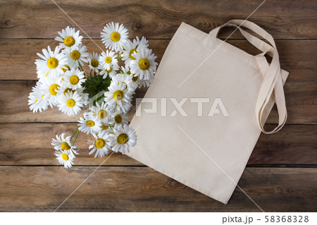 Rustic tote bag mockup with daisy Rustic tote bag mockup with daisy 58368328