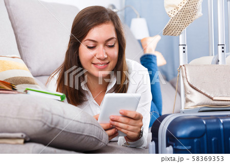 Woman booking online 58369353