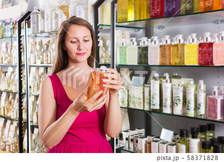 Woman buying liquid soap Woman buying liquid soap 58371828
