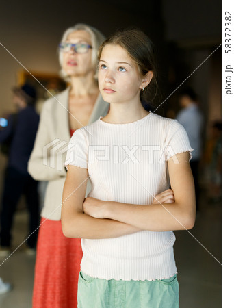Teenage girl visiting museum Teenage girl visiting museum 58372382
