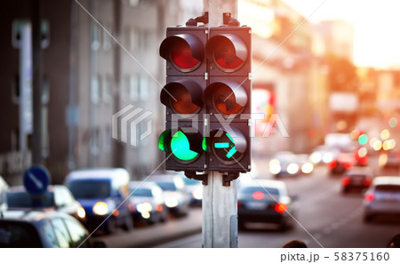 Cars moving on the road in city in late evening 58375160
