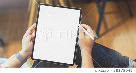 Professional freelancer editing his concept with Professional freelancer editing his concept with 58378049