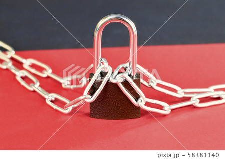 padlocked metal chain 58381140