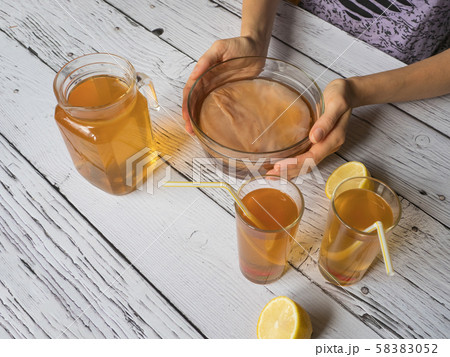 Kombucha fermenting tea with symbiotic culture  58383052