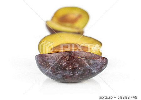 Sweet purple plum isolated on white Sweet purple plum isolated on white 58383749
