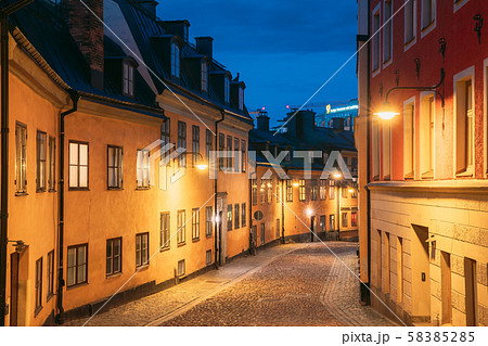 Stockholm, Sweden. Night View Of Traditional Stockholm Street. Residential Area, Cozy Street In Stockholm, Sweden. Night View Of Traditional Stockholm Street. Residential Area, Cozy Street In 58385285