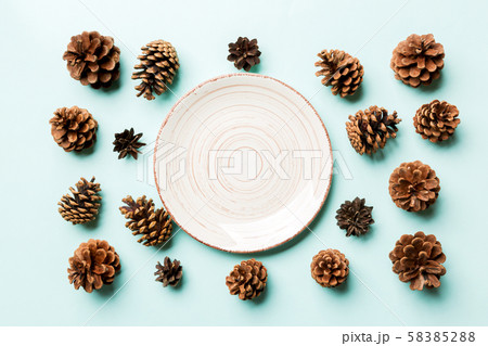 Top view of festive plate with pine cones on 58385288