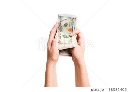 Isolated image of female hands counting dollars on Isolated image of female hands counting dollars on 58385406
