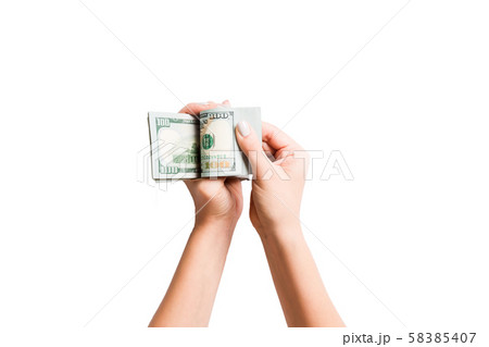 Top view of female hands counting dollar banknotes 58385407