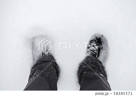 Male feet in deep snow Male feet in deep snow 58385571