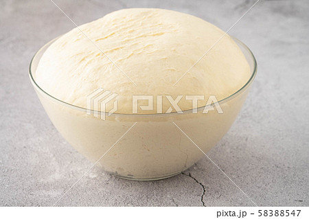 Fresh dough on the table. Copy space. 58388547