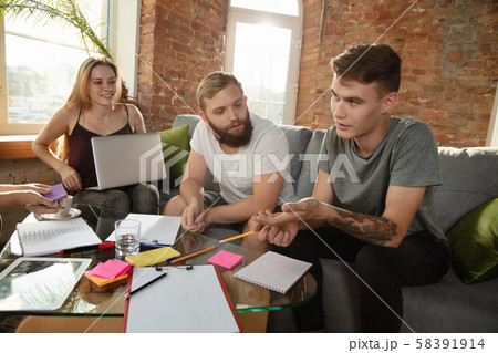 Group of young caucasian office workers have creative meeting to discuss new ideas 58391914