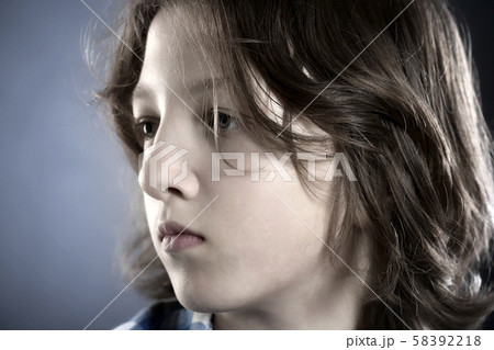 Portrait of a Boy with Brown Hair Outdoors. Portrait of a Boy with Brown Hair Outdoors. 58392218