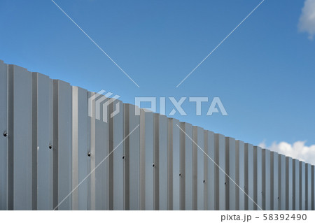 Metal fence against the sky 58392490