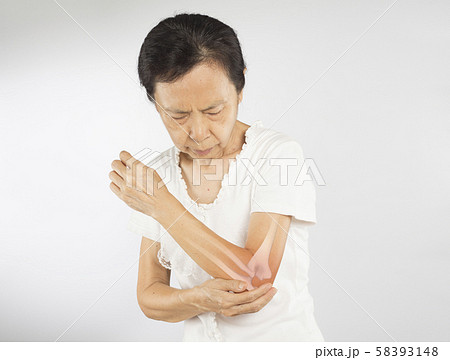 old asian woman feel elbow bones injury old asian woman feel elbow bones injury 58393148