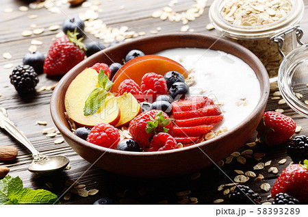 Fruit healthy muesli with peaches strawberry Fruit healthy muesli with peaches strawberry 58393289