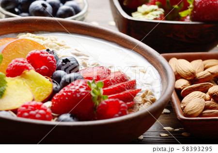 Fruit healthy muesli with peaches strawberry Fruit healthy muesli with peaches strawberry 58393295