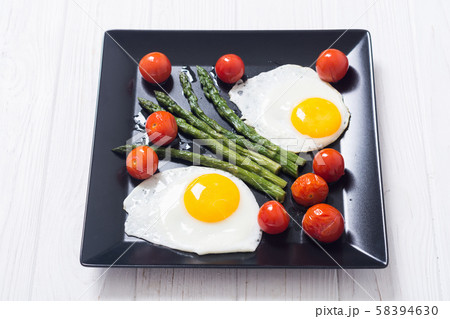 Healthy breakfast with eggs , asparagus and Healthy breakfast with eggs , asparagus and 58394630