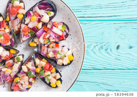 Traditional  Peruvian food background with mussels 58394636